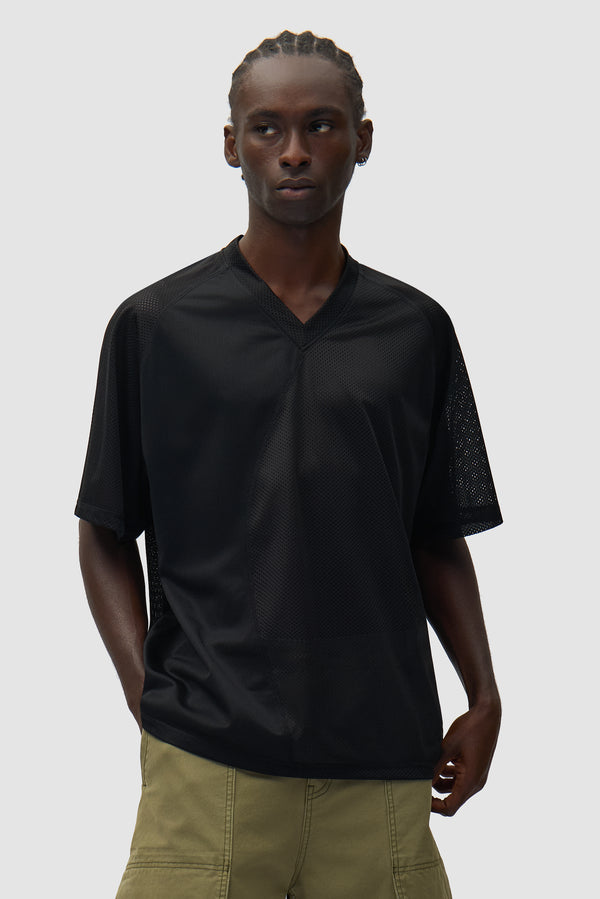 Multi Mesh T-shirt in Black worn by a model, half-body front view