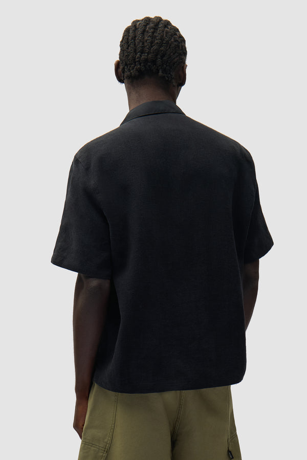 Nylon Linen Shirt in Black worn by a model, half-body front view