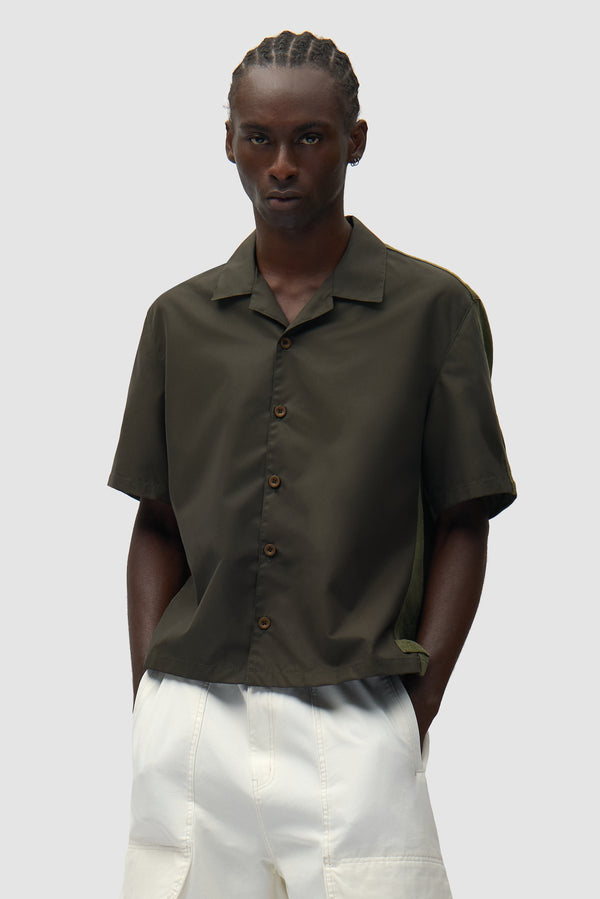 Nylon Linen Shirt in Green worn by a model, half-body front view