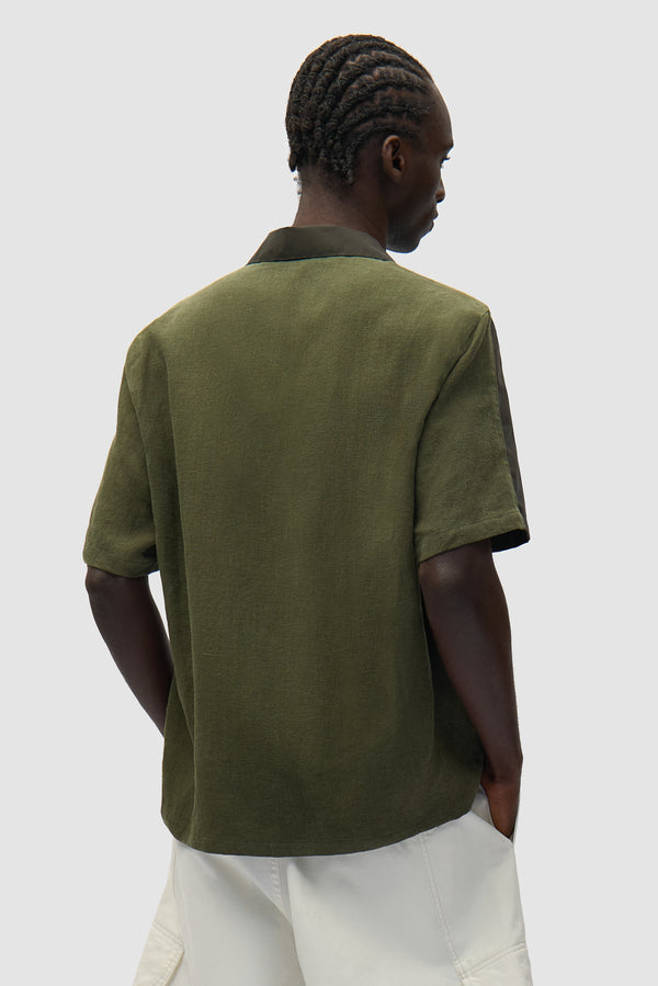 Nylon Linen Shirt in Green worn by a model, half-body back view
