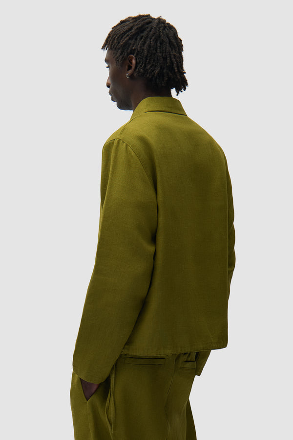 Linen Quarter Zip Pullover in Green worn by a model, half-body back view