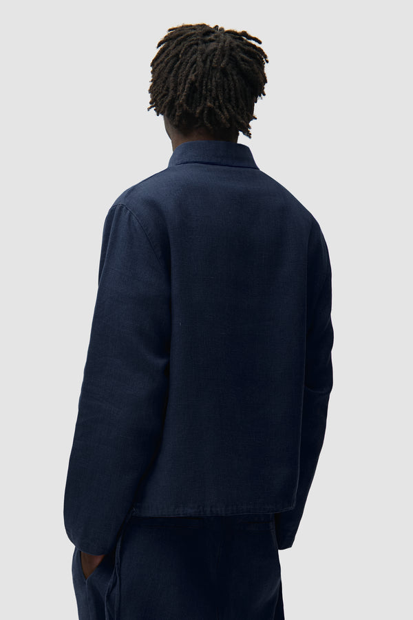 Linen Quarter Zip Pullover in Navy worn by a model, half-body back view