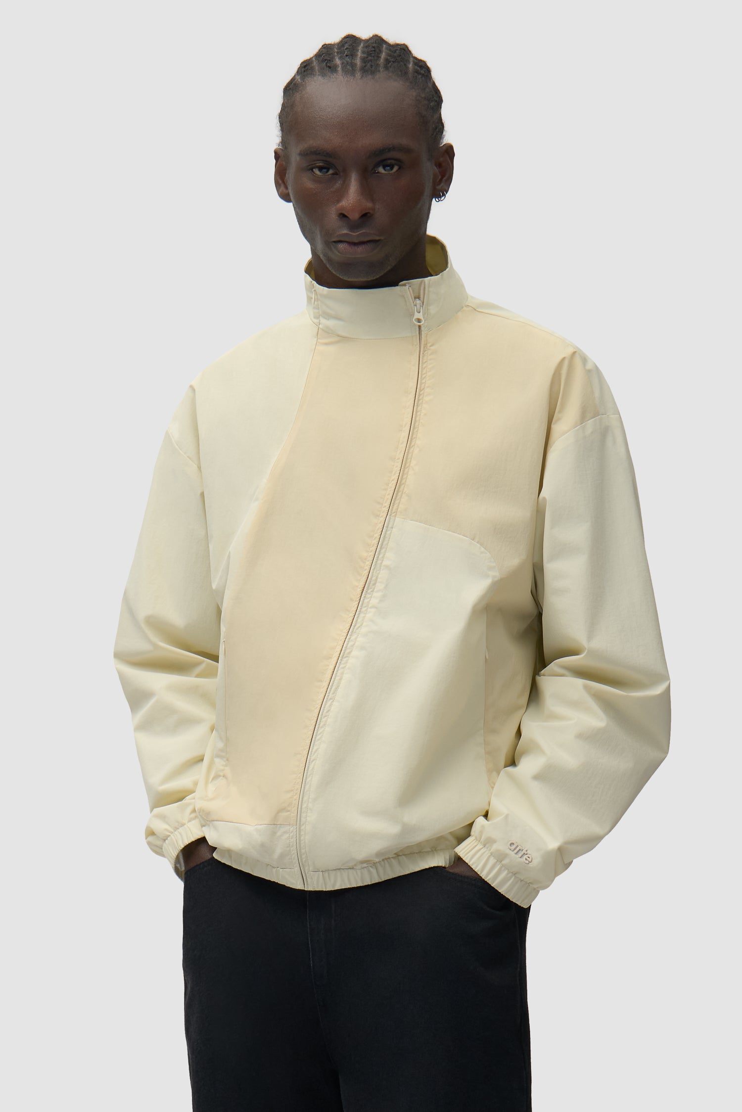 Curve Zipper Jacket in Cream worn by a model, half-body front view