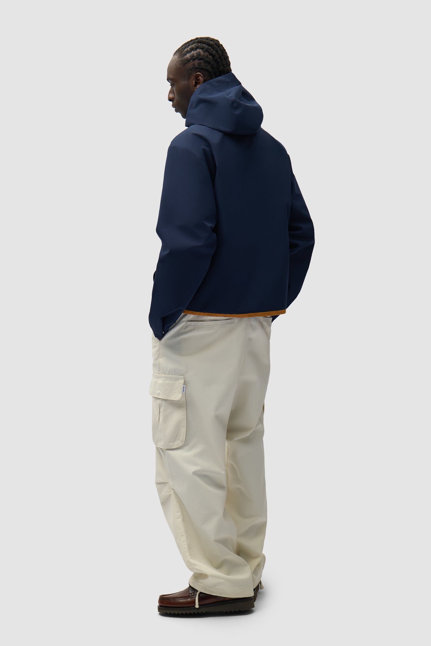 Linen Tape Hooded Jacket in Navy worn by a model, full-body back view