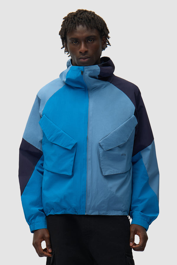 MultiColor Technical Jacket in Blue worn by a model, half-body front view