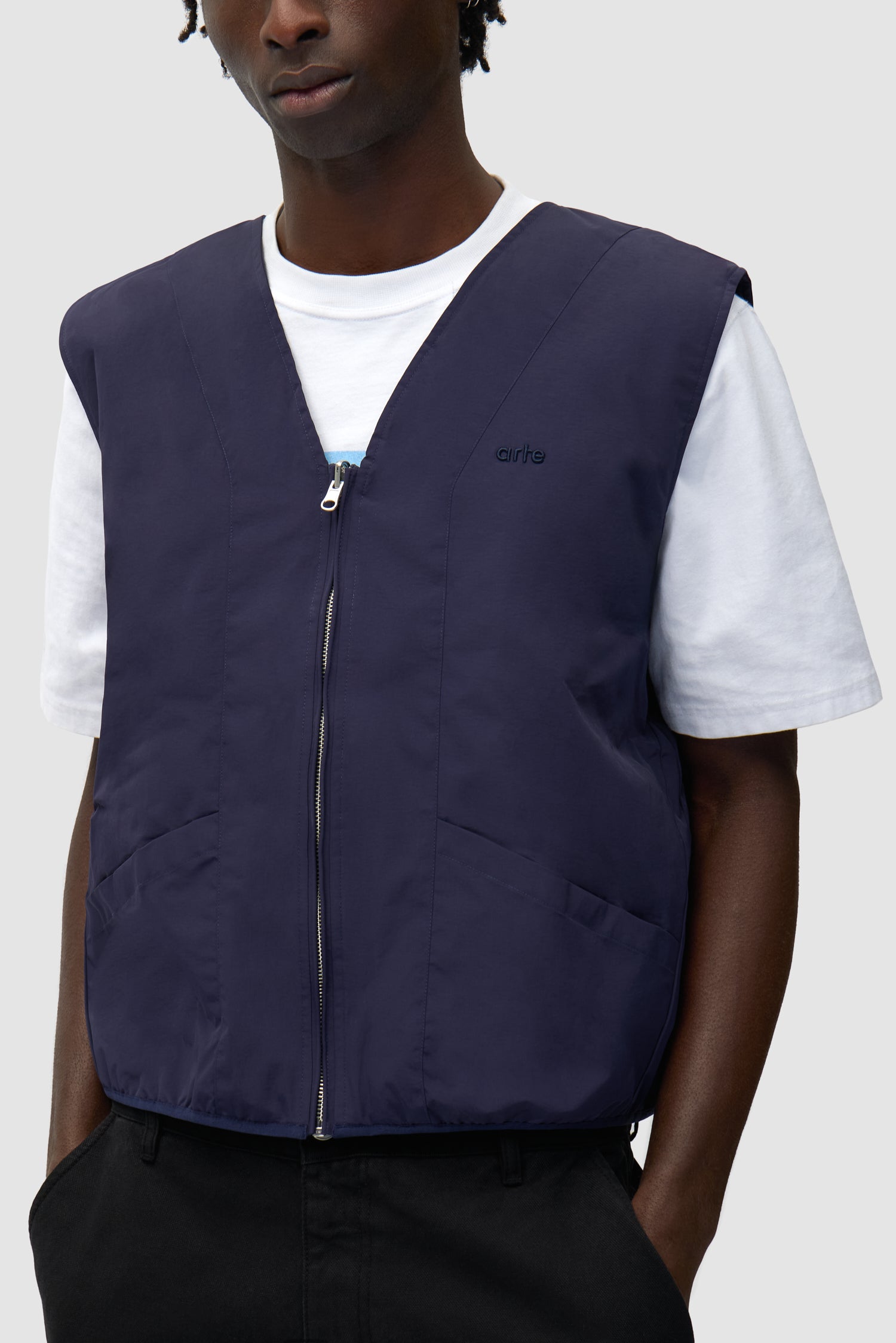 Detail view of MultiColor Technical Jacket in Blue, showing inside vest