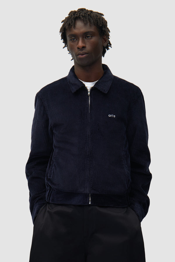 Corduroy Jacket in Navy worn by a model, half-body front view