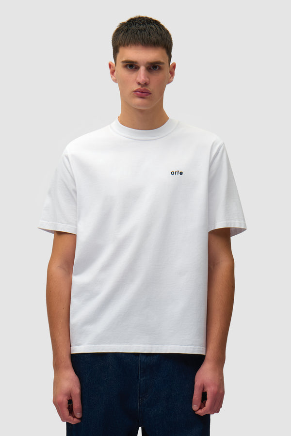 Back Poster T-shirt in White worn by a model, half-body front view
