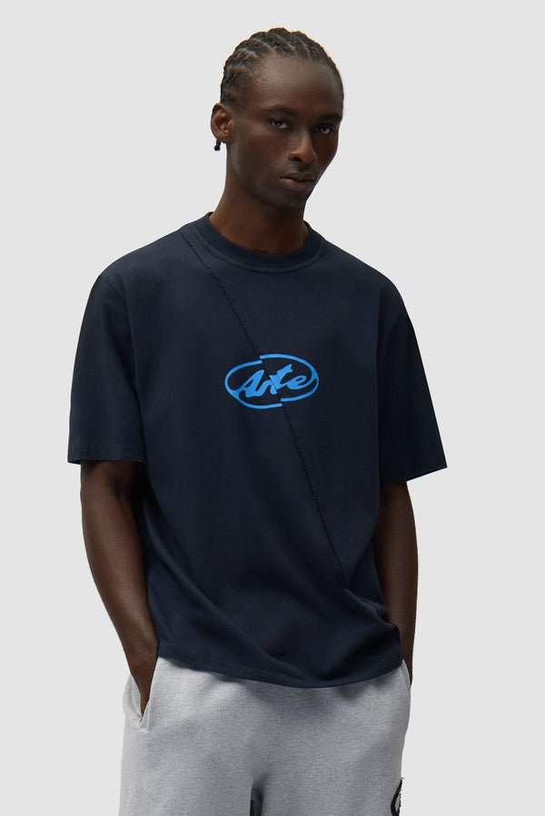 Circle Logo T-shirt in Navy worn by a model, half-body front view