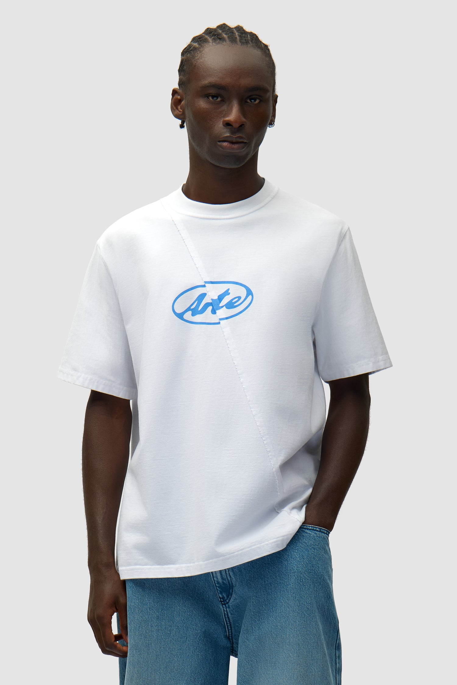 Circle Logo T-shirt in White worn by a model, half-body front view
