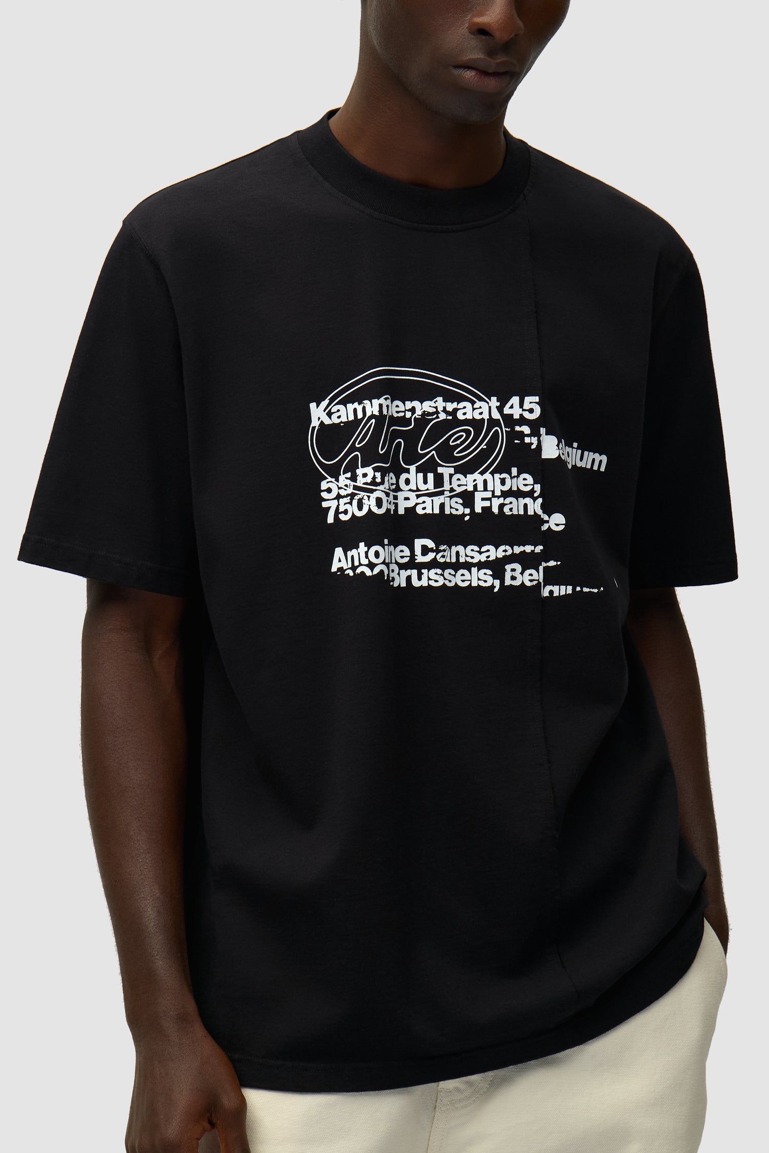 Address T-shirt in Black worn by a model, half-body detailed view