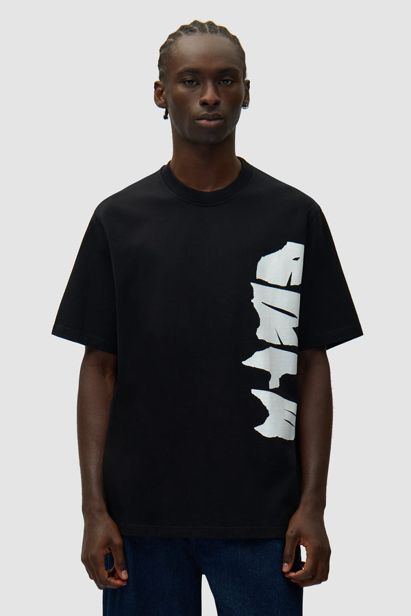 Side Logo T-shirt in Black worn by a model, half-body front view