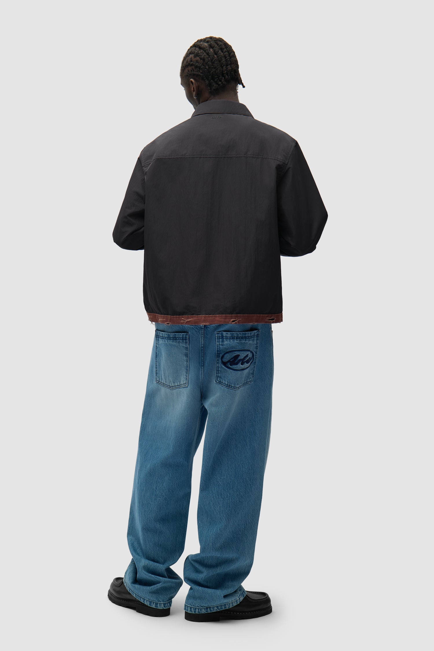 Linen Tape Classic Jacket in Black worn by a model, full-body back view