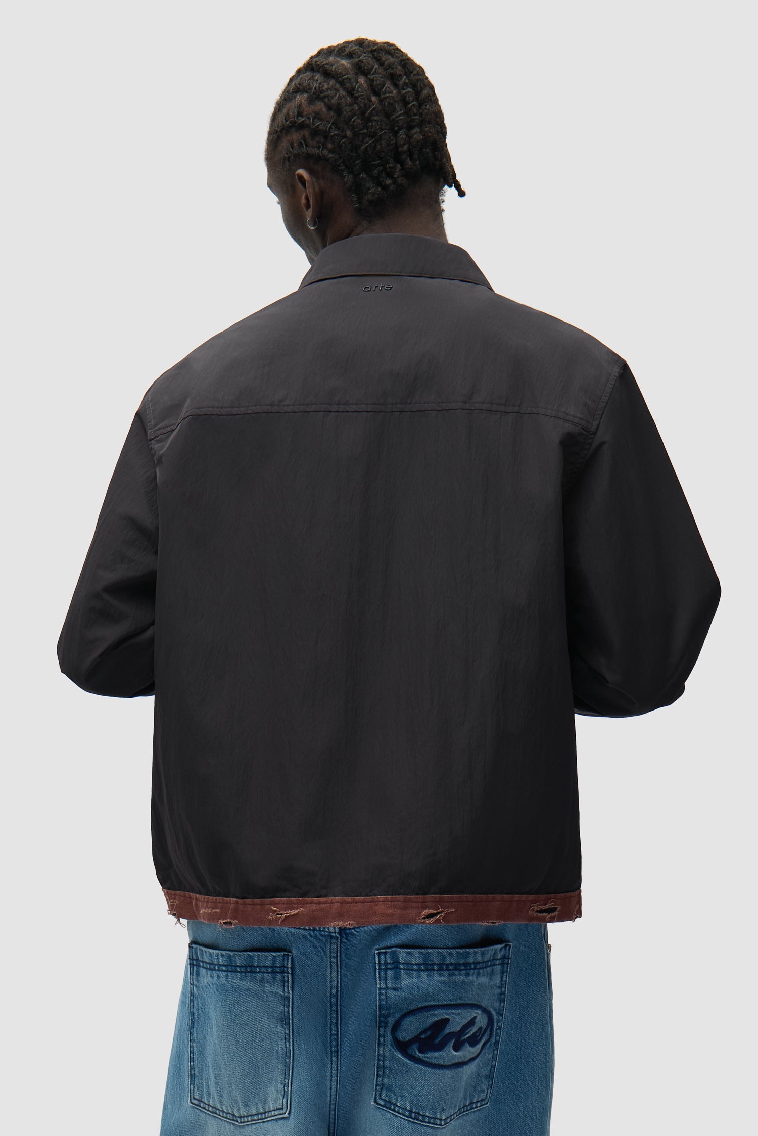 Linen Tape Classic Jacket in Black worn by a model, half-body back view