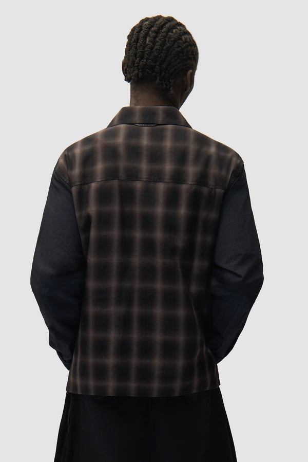 Plaided shirt Jacket in Plaid worn by a model, half-body back view