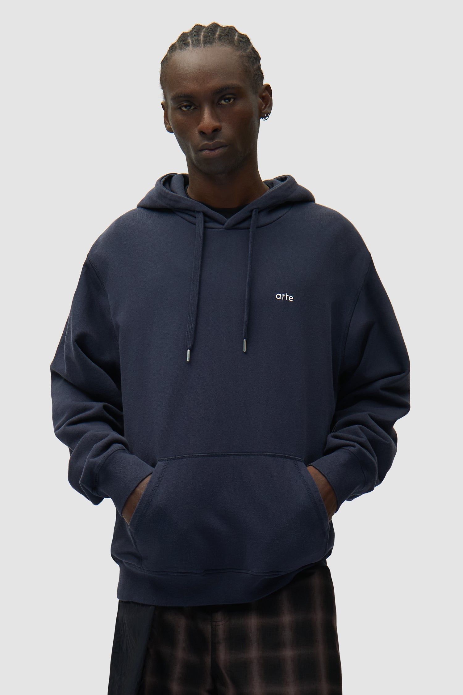 Back Poster Hoodie in Navy worn by a model, half-body front view