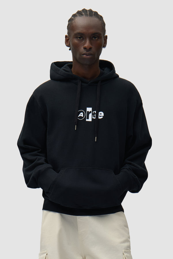 Collage Logo Hoodie in Black worn by a model, half-body front view