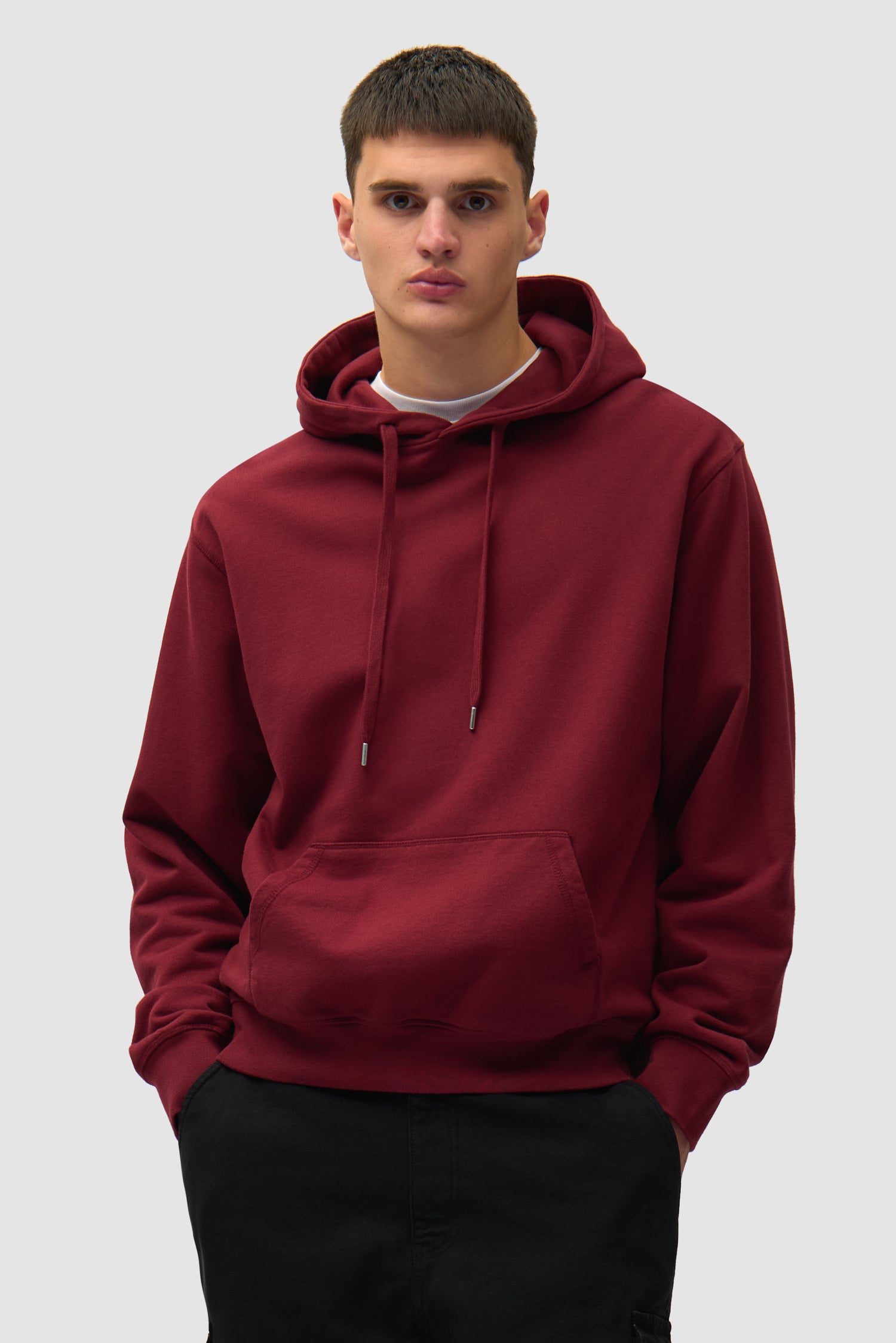 Back Abstract Hoodie in Bordeaux worn by a model, half-body front view