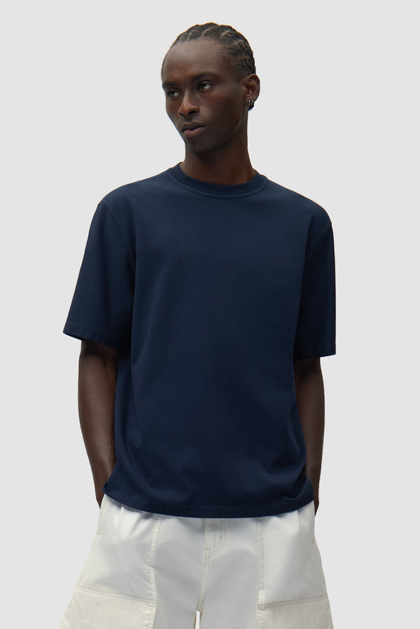 Abstract Back Print T-shirt in Navy worn by a model, half-body front view