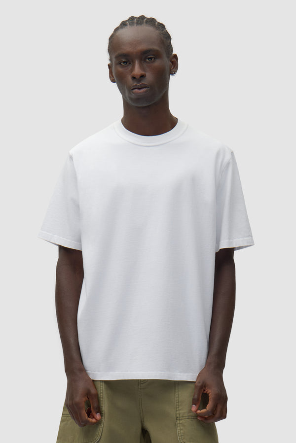 Faded Back Print T-shirt in White worn by a model, half-body front view