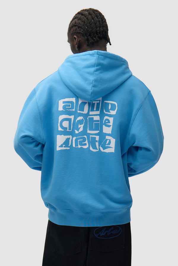 Multi Back Logo Hoodie in Blue worn by a model, half-body back view