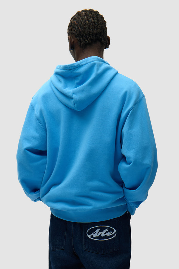 Circle Logo Zip Hoodie in Blue worn by a model, half-body back view