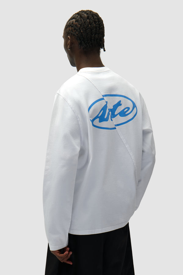 Back Circle Logo Longsleeve in White worn by a model, half-body back view