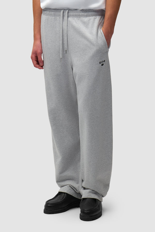 Heart Logo Sweatpants in Grey worn by a model, half-body front view