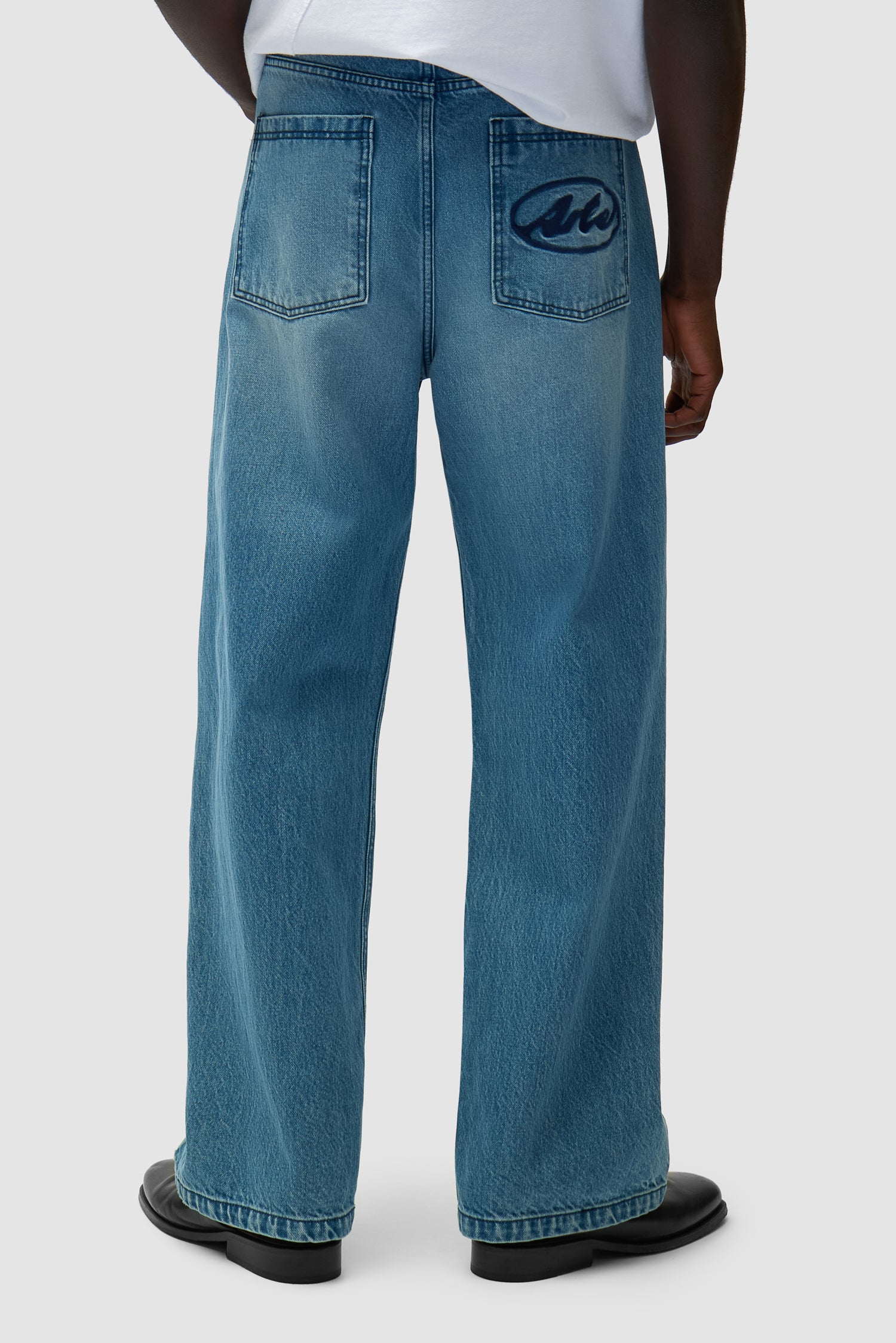 Pantalon à poche avec logo circulaire - Denim Bleach