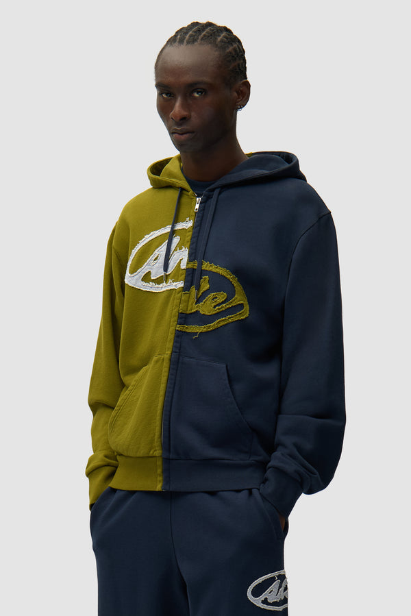 Split Patch Zip Hoodie in Green/Navy worn by a model, half-body front view