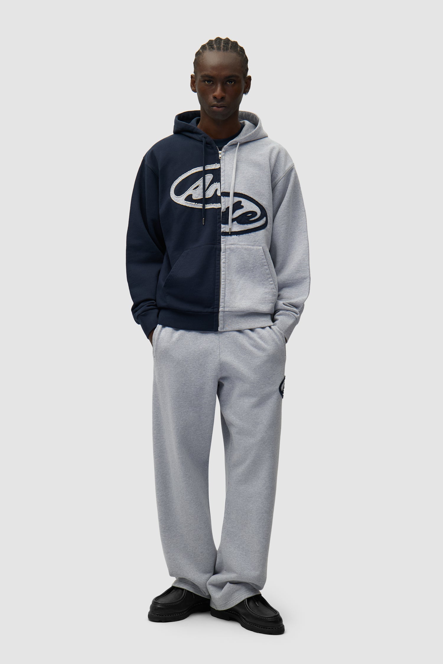 Split Patch Zip Hoodie in Grey/Navy worn by a model, full-body front view