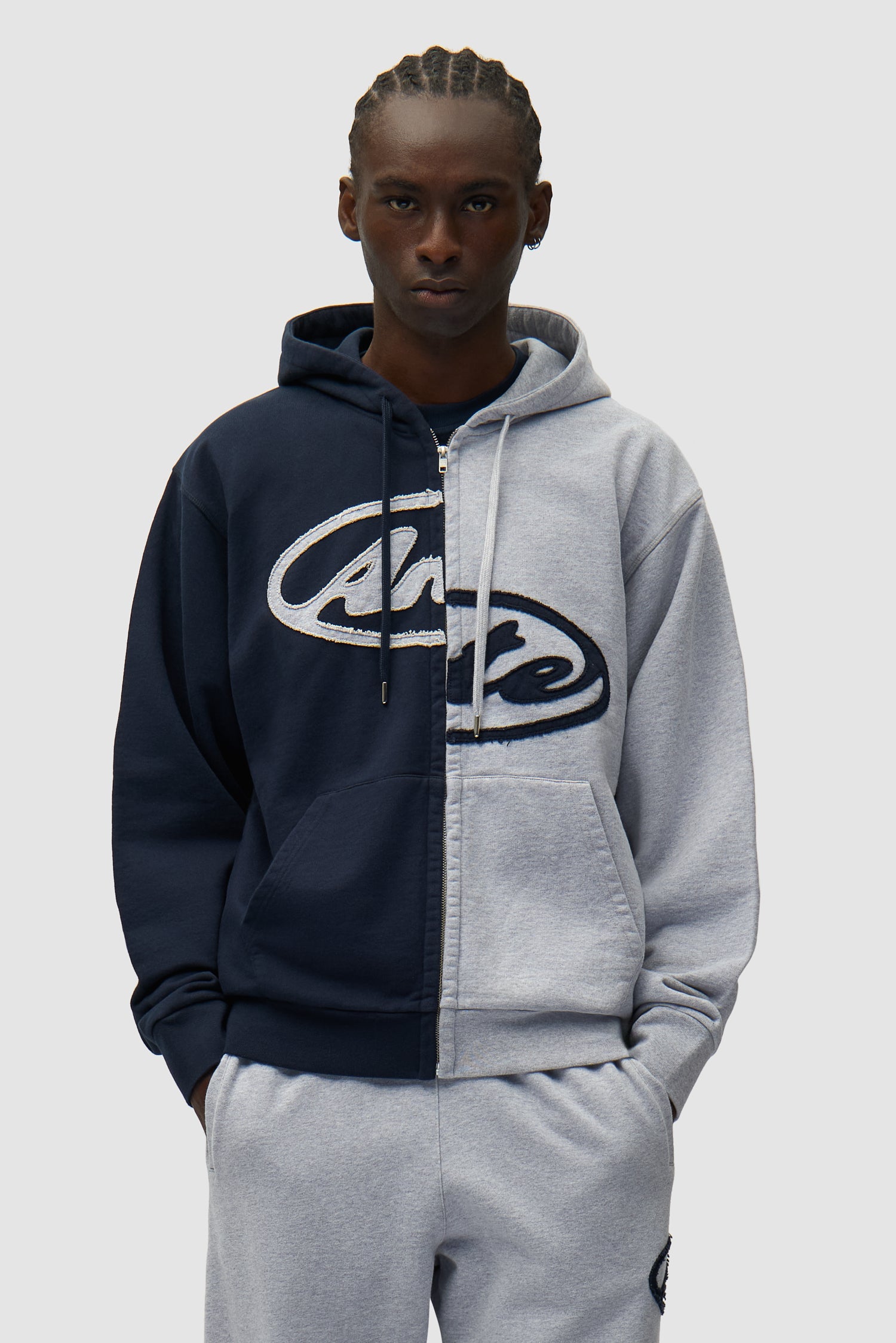 Split Patch Zip Hoodie in Grey/Navy worn by a model, half-body front view