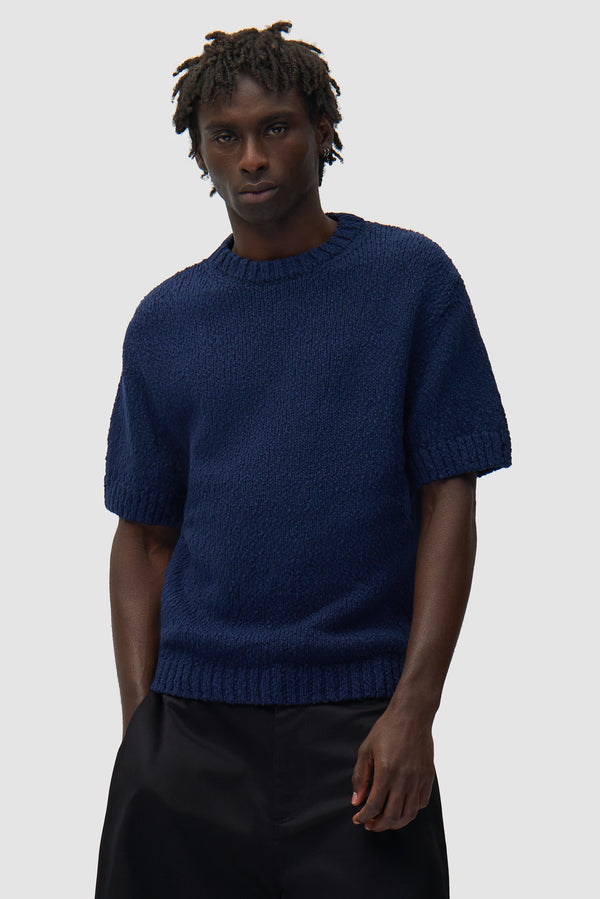Back graphic Knit T-shirt in Navy worn by a model, half-body front view