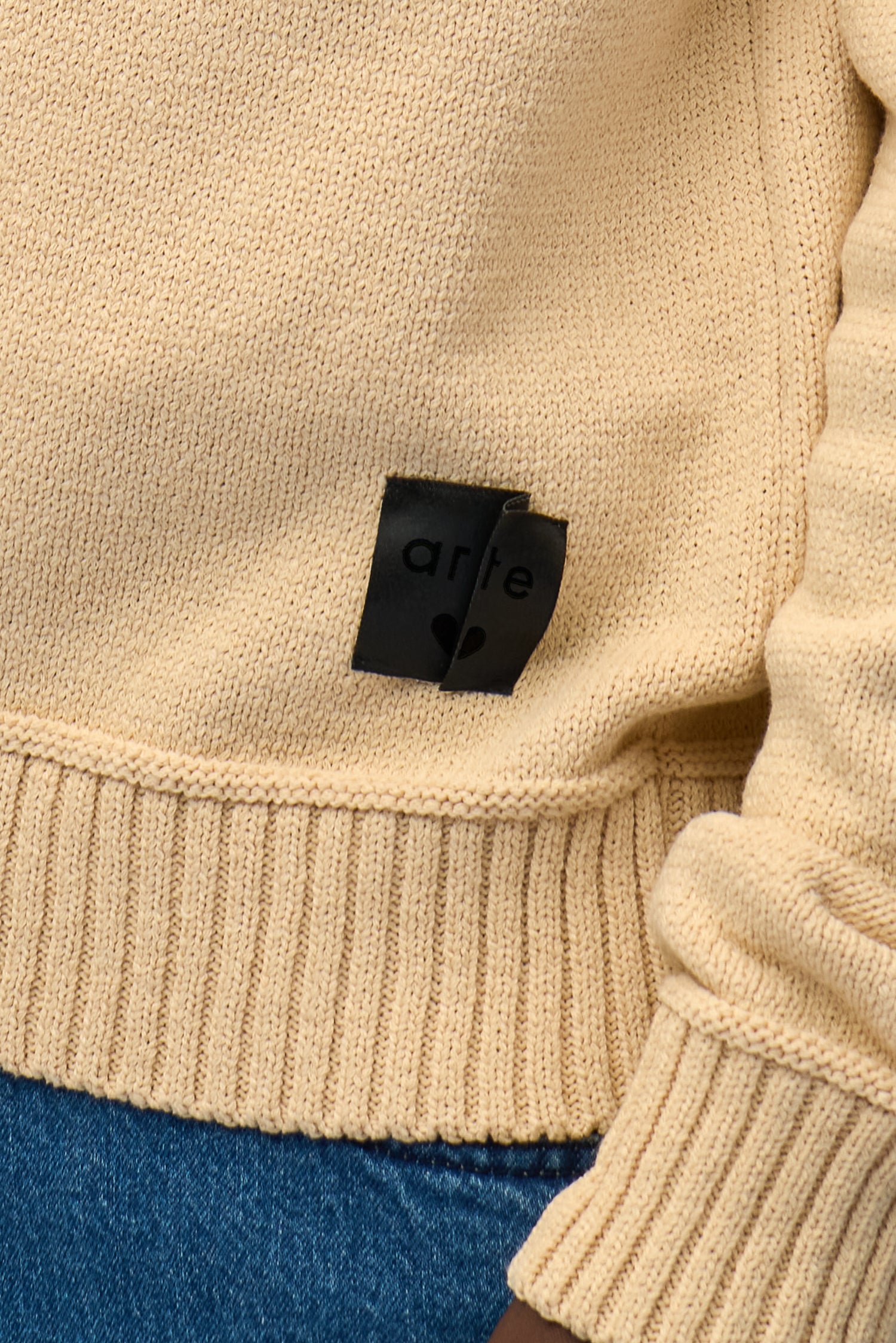 Étiquette réversible en tricot couleur crème, vue arrière