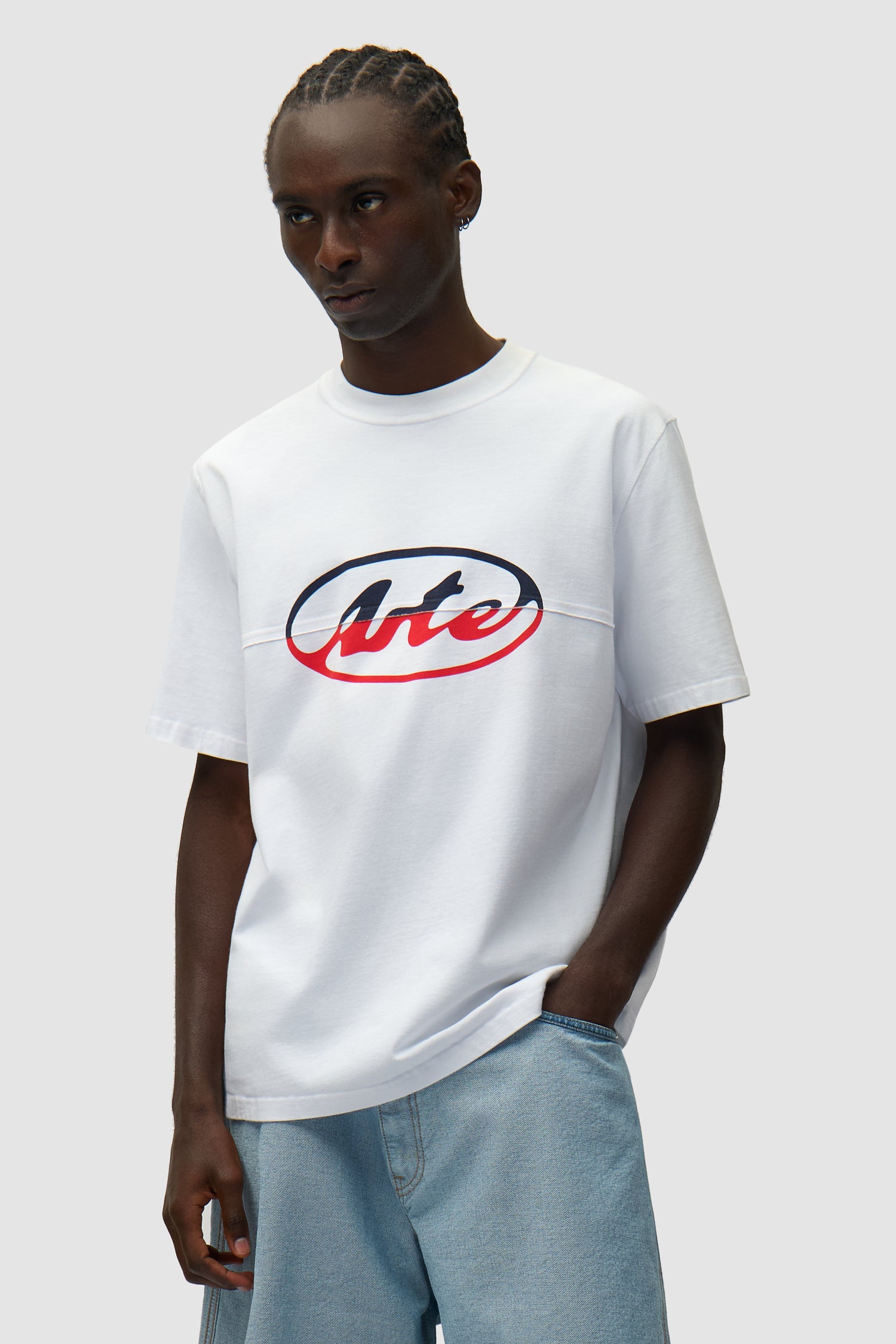 Circle Logo Cut T-shirt in White worn by a model, half-body front view