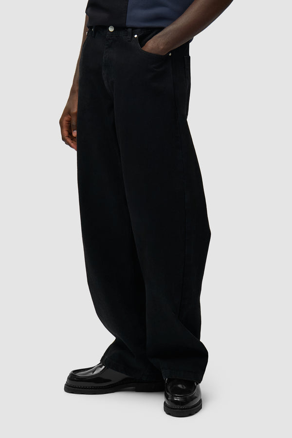 Circle Logo Pocket Pants in Black worn by a model, half-body front view