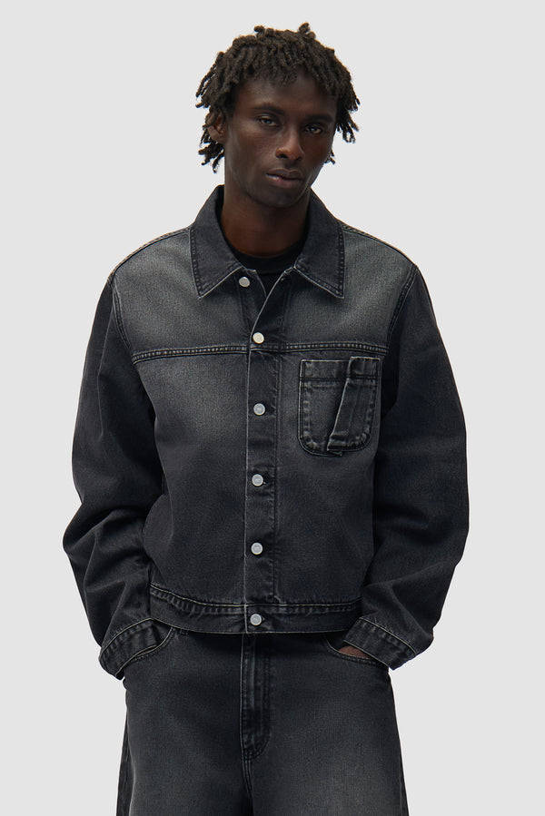Fold Pocket Denim Jacket in Fade Black worn by a model, half-body front view