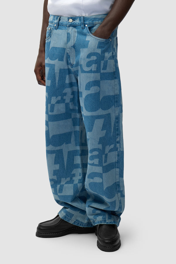Denim Allover Pants in Raw Denim worn by a model, half-body front view