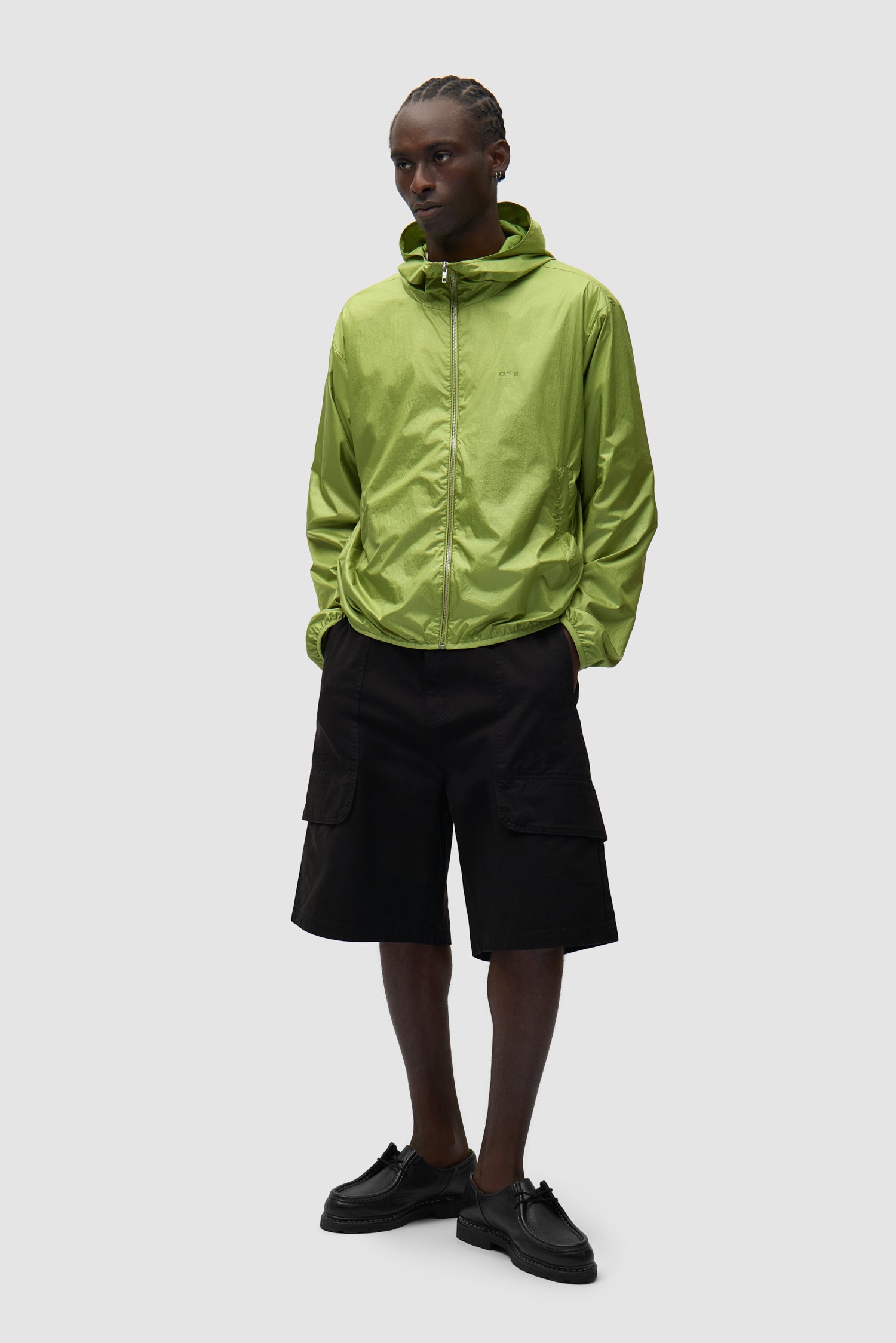 Shiny Nylon Jacket in Green worn by a model, full-body front view