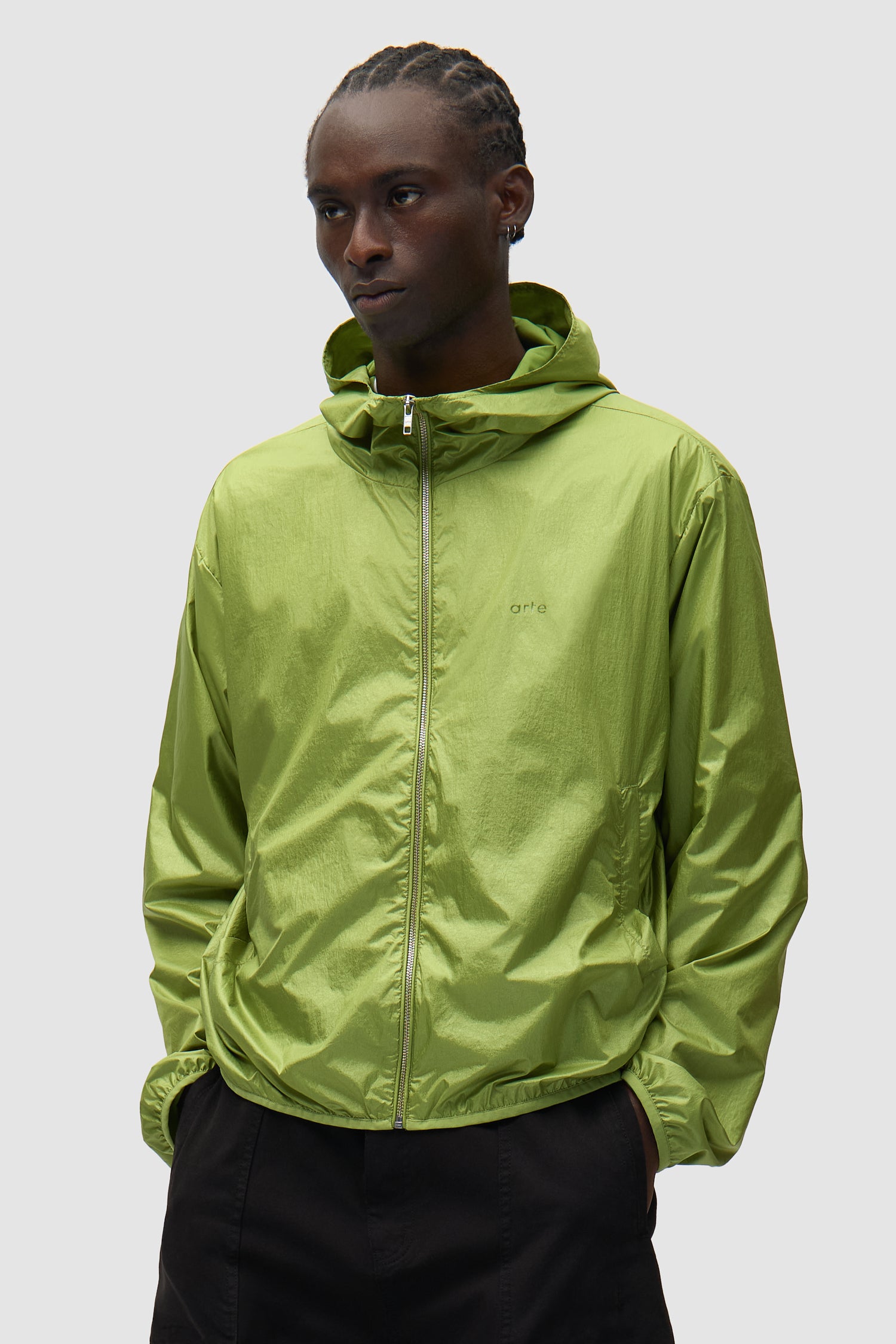 Shiny Nylon Jacket in Green worn by a model, half-body front view