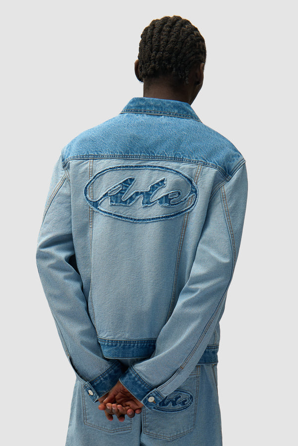 Denim Inside/Out Jacket in Denim Bleach worn by a model, half-body back view