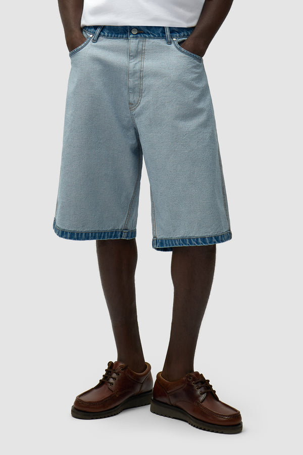 Denim Inside/Out Shorts in Denim Bleach worn by a model, half-body front view