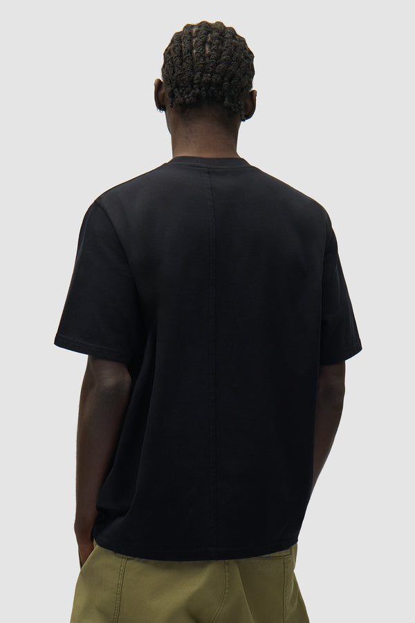 Photo T-shirt in Black worn by a model, half-body back view