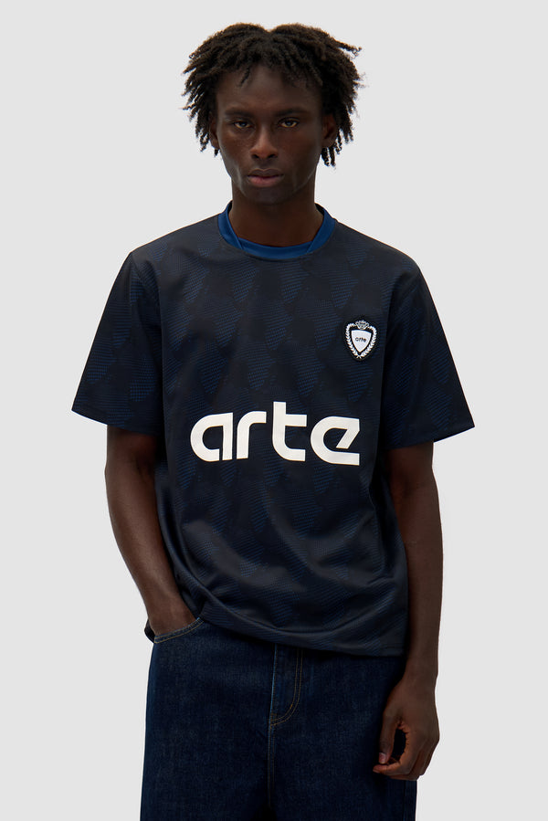 Footbal Shirt in Navy worn by a model, half-body front view