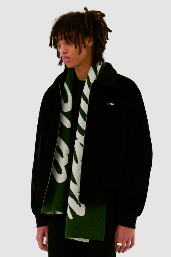 Antwerp Scarf in Green worn by a model, half-body front view
